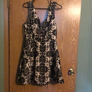 An XL pink dress with black details brand new